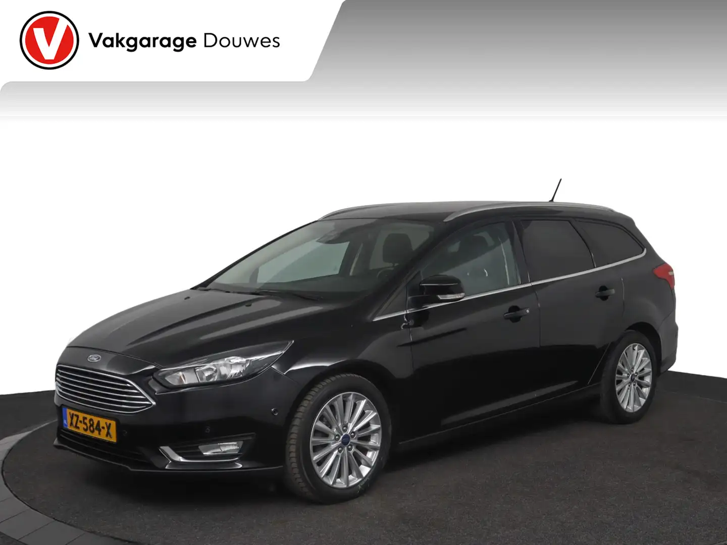Ford Focus Wagon 1.0 Titanium | Navi | Cruise | Stoelverwarmi Zwart - 1