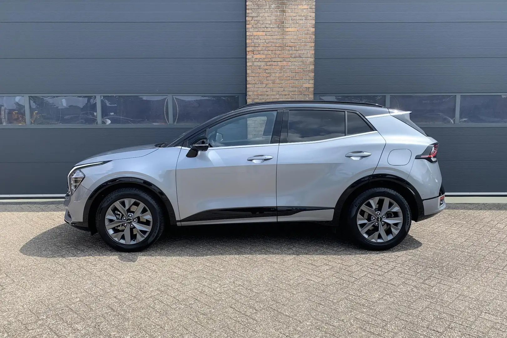 Kia Sportage 1.6 T-GDi Hybrid GT-PlusLine Schuif-/Kanteldak | S Grijs - 2