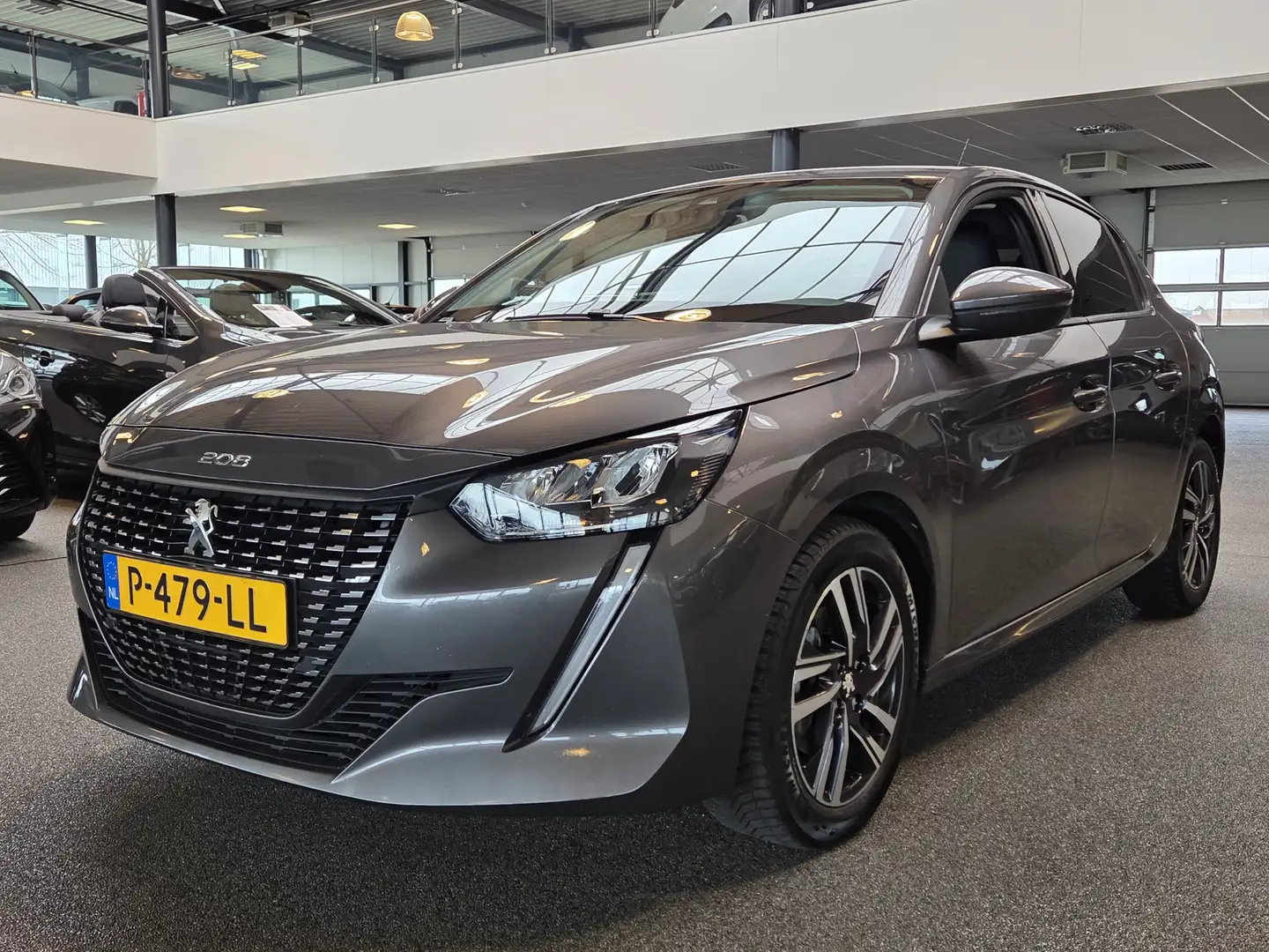 Peugeot 208 1.2 PureTech Blue Lease Allure / Carplay / DAB+ / Grau - 1
