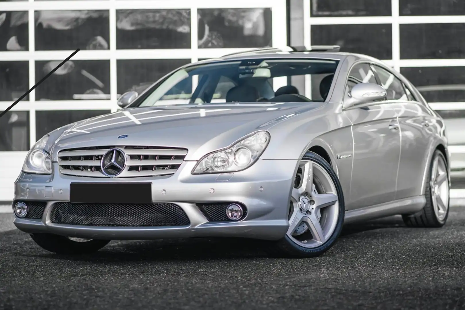 Mercedes-Benz CLS 55 AMG Mercedes-Benz CLS 55 AMG | 2006 | 84.400 km | Full Option | Klasse 2, vervangingswaarde €35.000 Plateado - 1