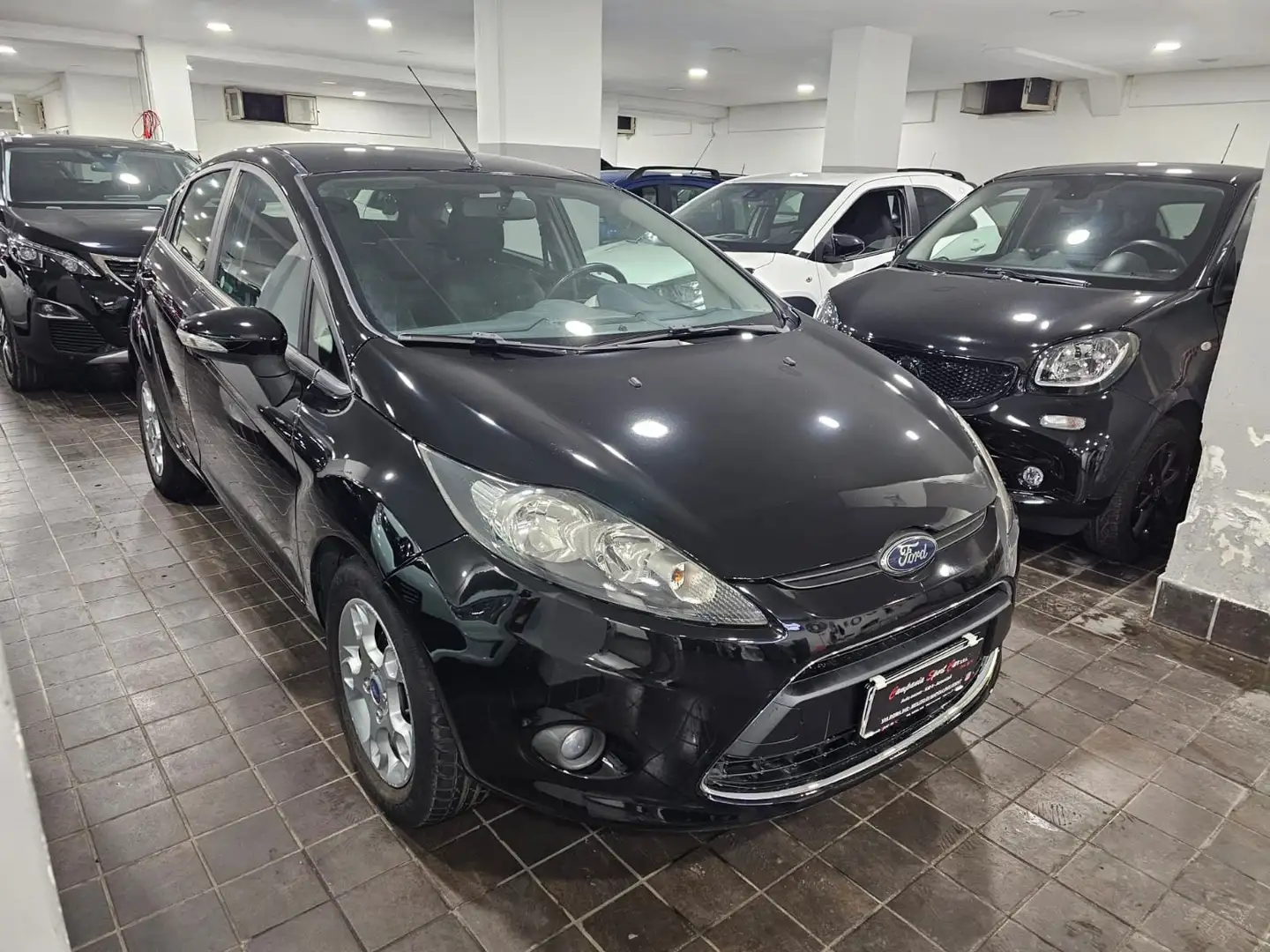 Ford Fiesta 5 PORTE TITANIUM 1.4 TDCI 70CV - TAGLIANDATA Negro - 1