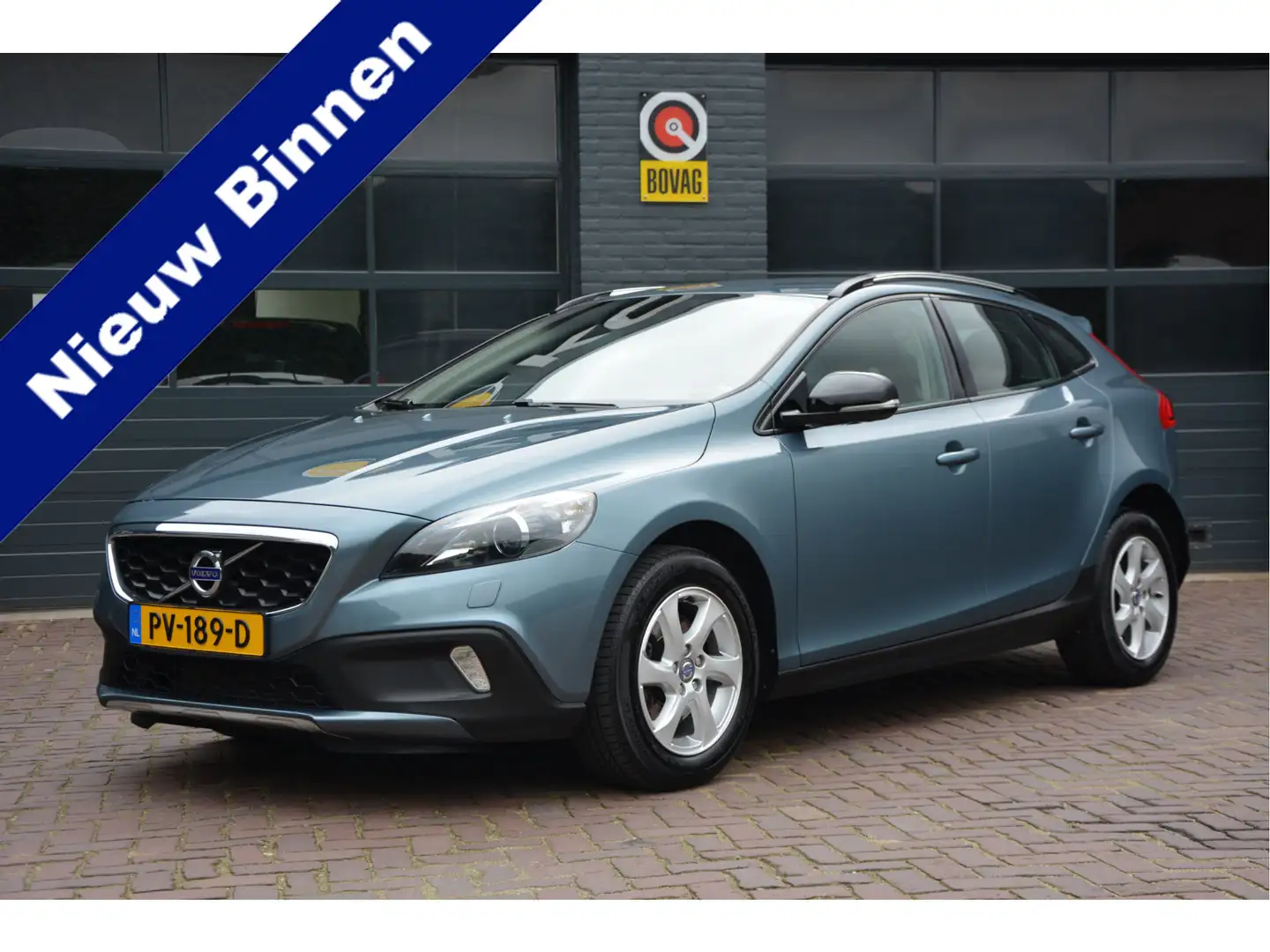 Volvo V40 Cross Country 1.6 T4 Momentum Automaat Blauw - 1