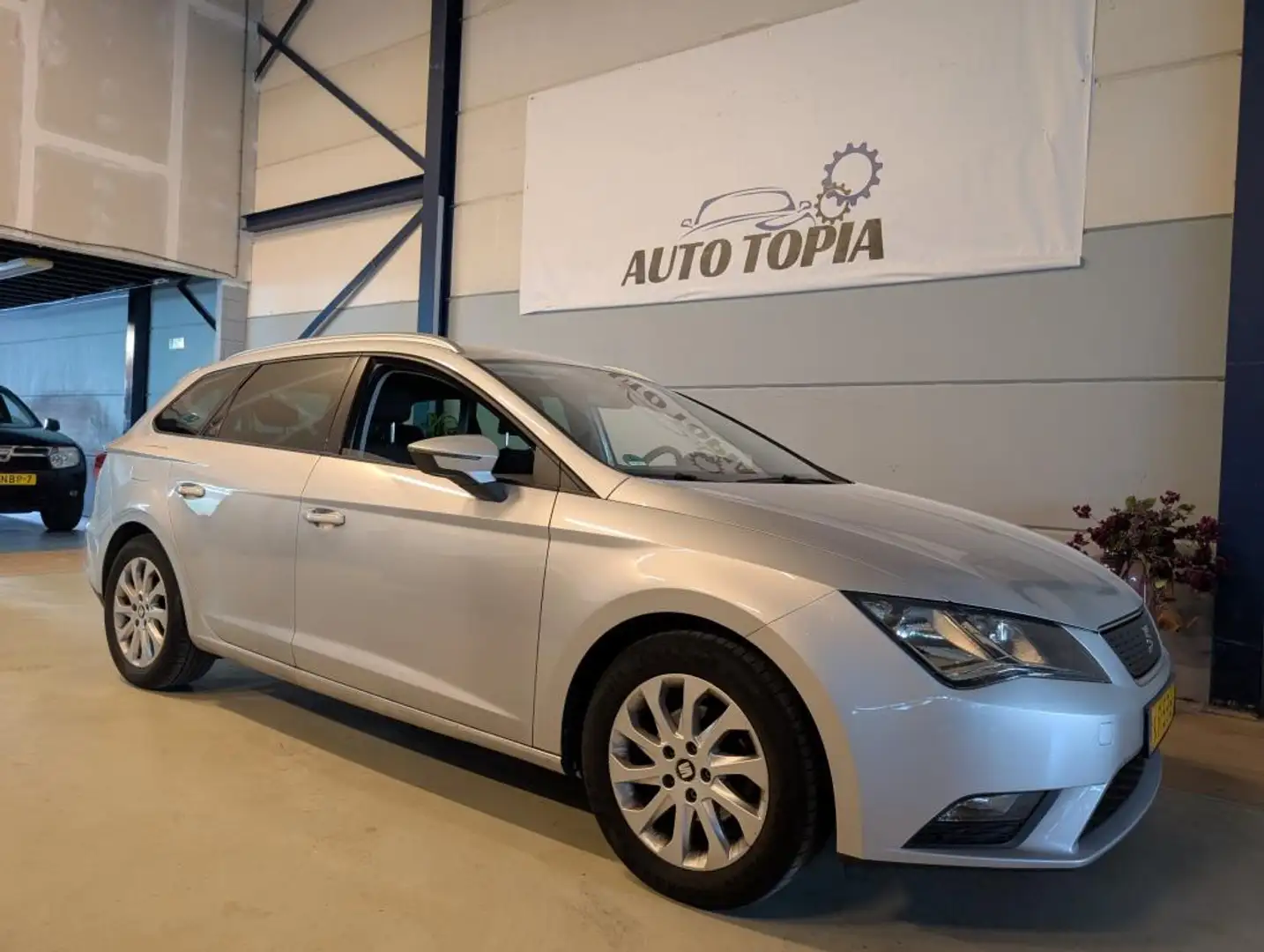 SEAT Leon ST 116 pk EcoTSI Style Connect *Clima - Navi - Car Grijs - 1