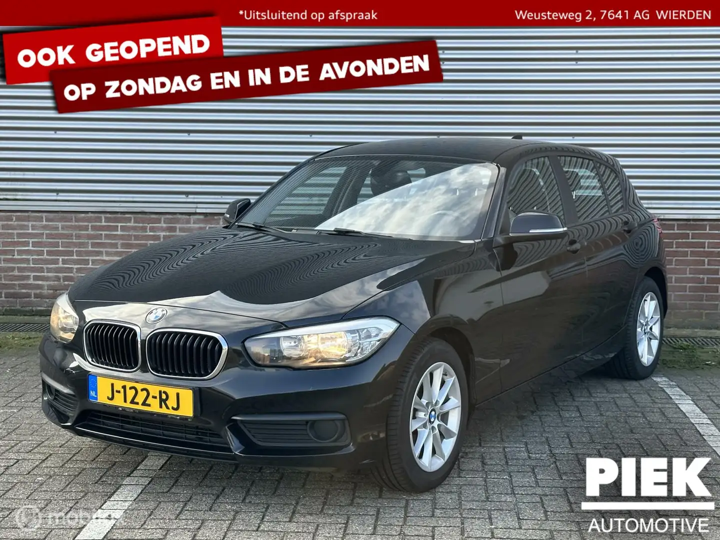 BMW 116 1-serie 116i High Executive NETTE STAAT, NAVIGATIE Zwart - 1