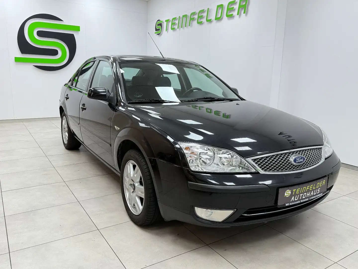 Ford Mondeo 1.8 Lim. Ghia KLIMA / SITZHEIZUNG Schwarz - 1