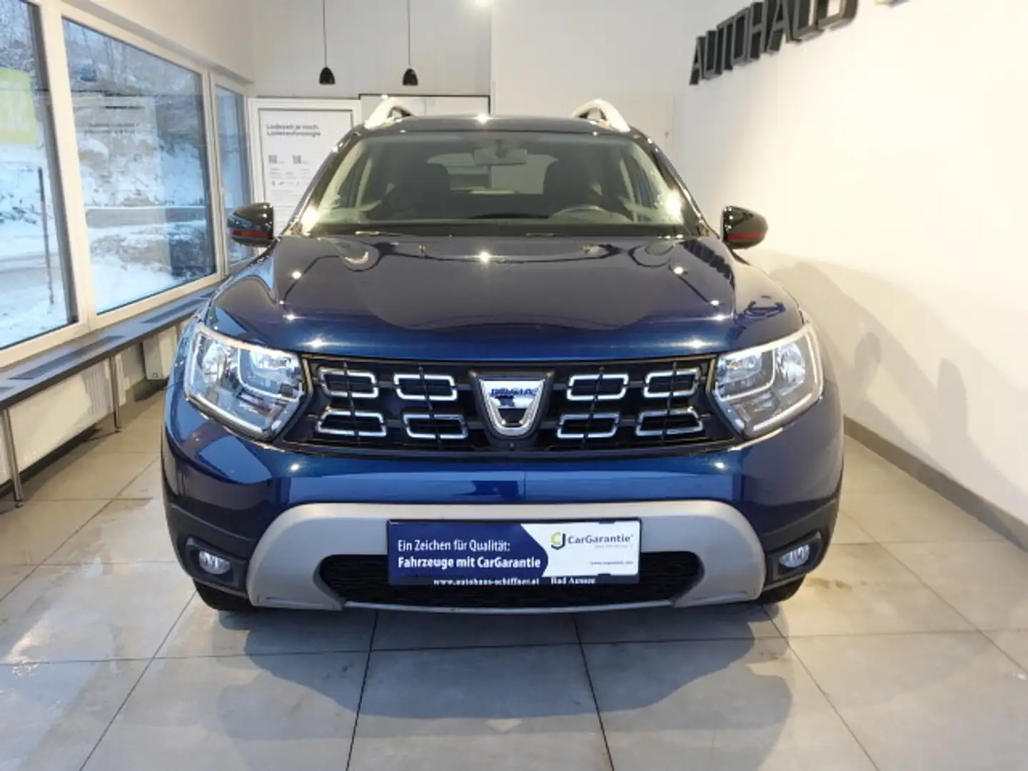 Dacia Duster SCe 115 S&S 4WD Charisma Blau - 2