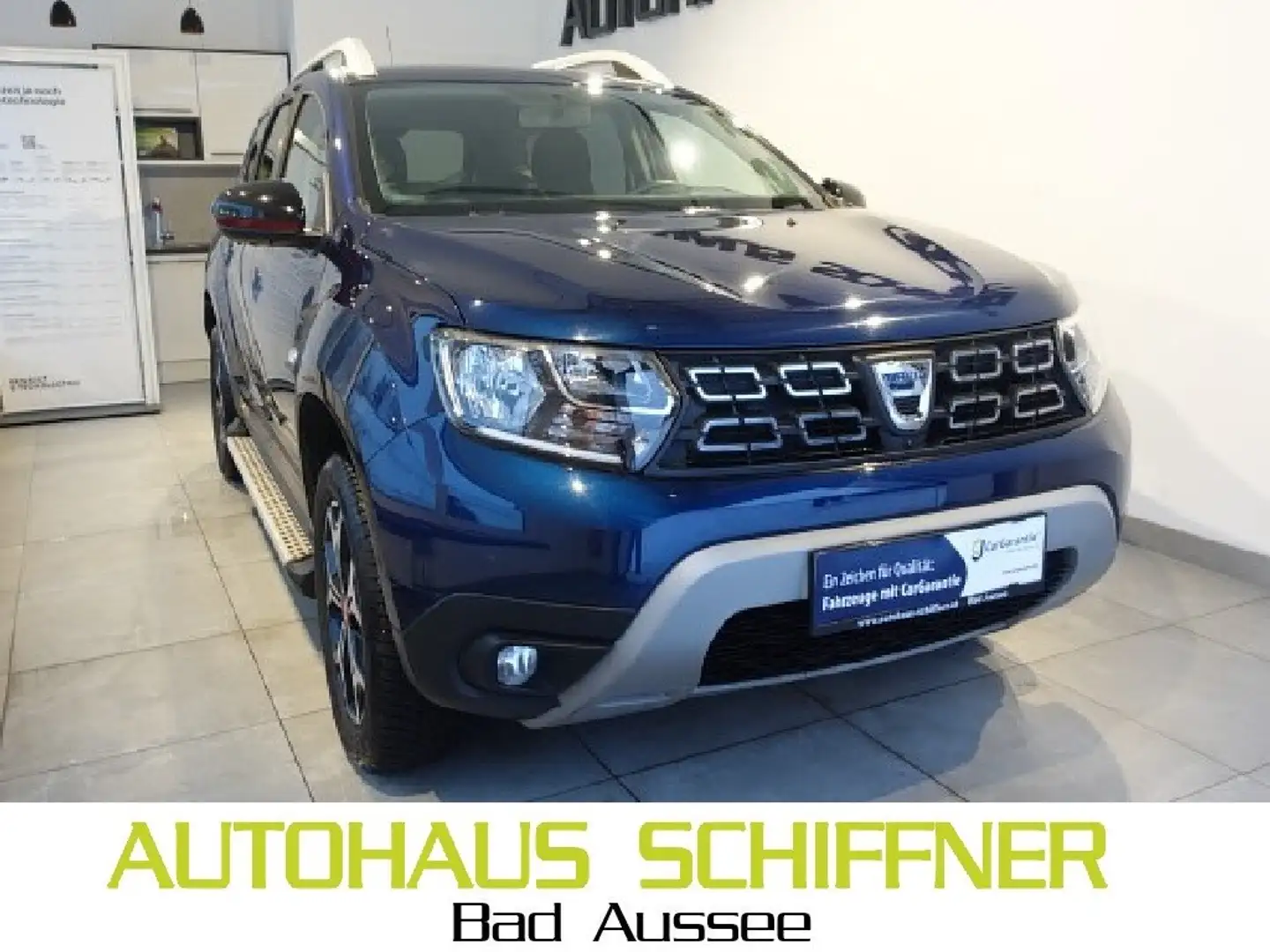 Dacia Duster SCe 115 S&S 4WD Charisma Blau - 1
