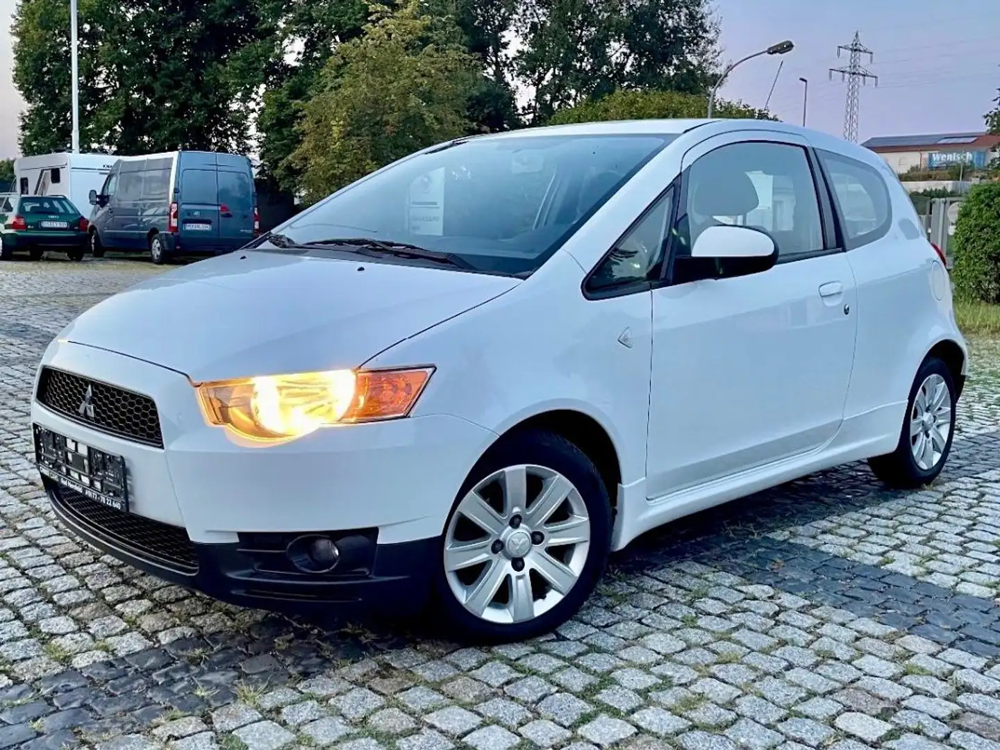 Mitsubishi Colt 1.1 75PS SHZ TÜV 11/26 Klima 81Tkm 1.Hd Weiß - 1