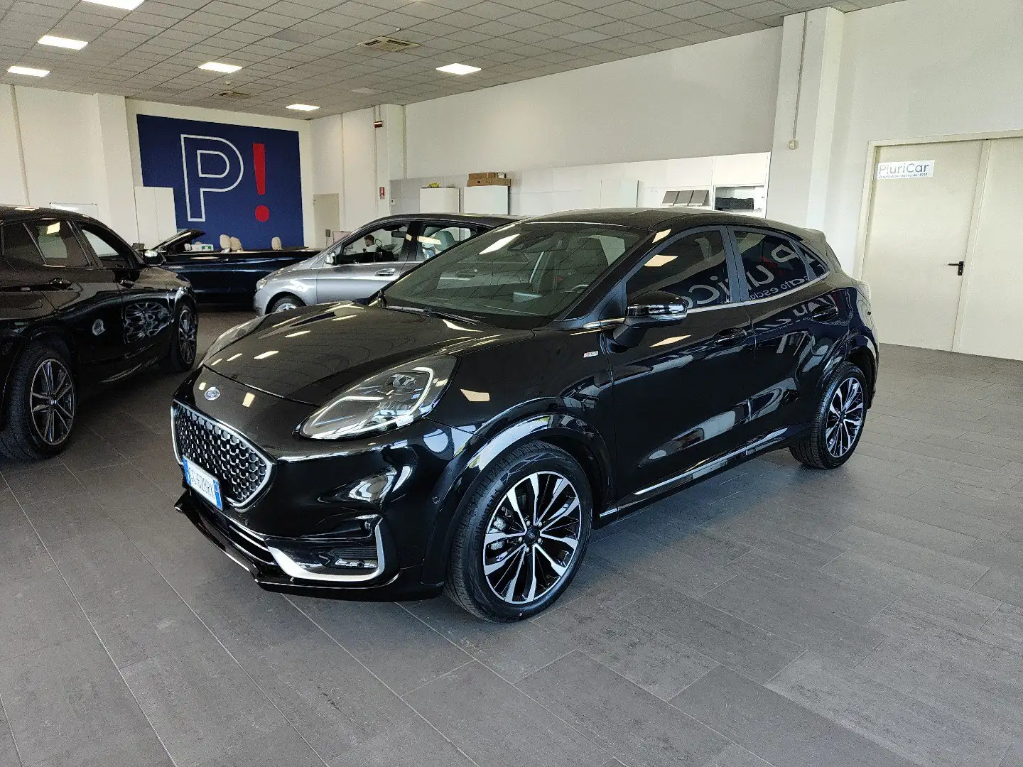Ford Puma 1.0 EcoBoost Hybrid ST-Line Vignale Auto Pelle Zwart - 1