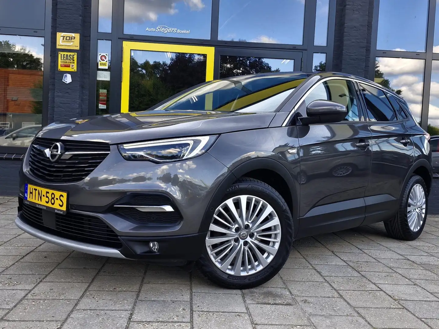 Opel Grandland X 1.2 Turbo Innovation | Parkeersensoren | Navi | Te Grijs - 1