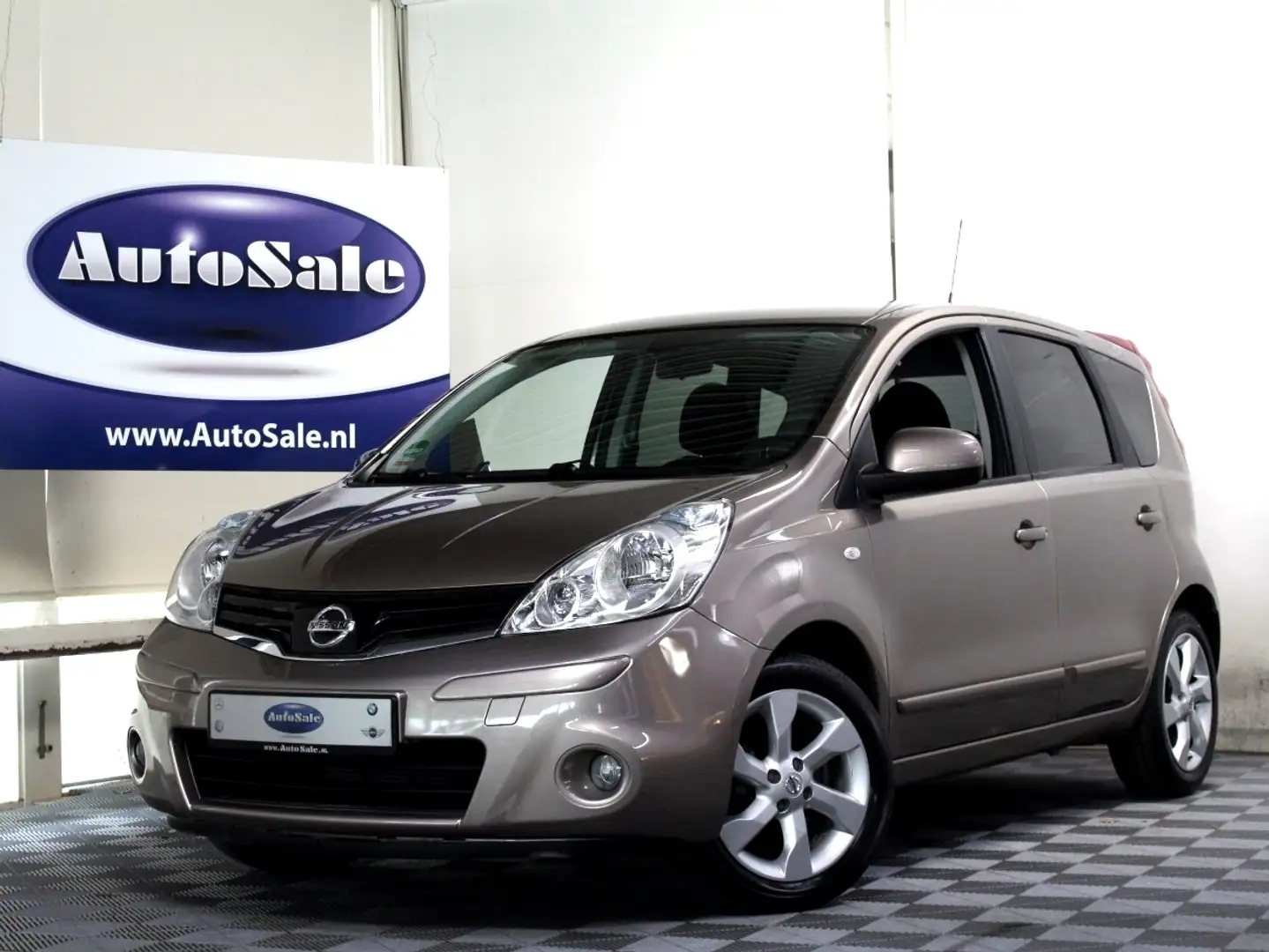 Nissan Note 1.6 Tekna AUTOMAAT 1eEIGNR! NAVI BT CRUISE '10 Beżowy - 1