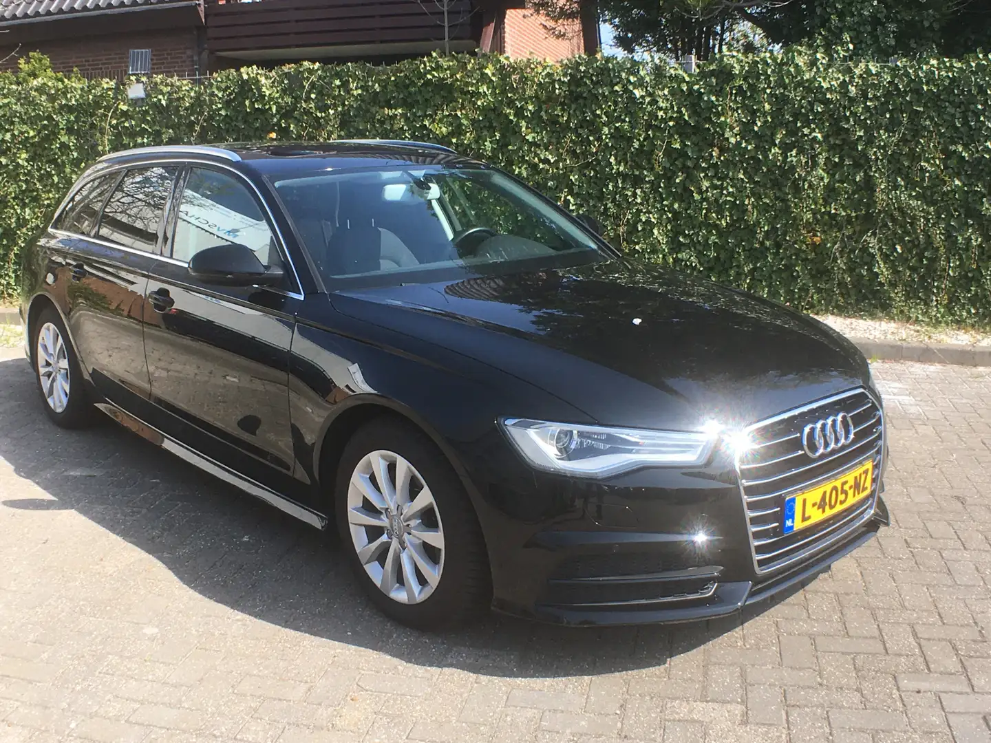 Audi A6 Avant 1.8 TFSI ultra Advance Sport Navigatie, Pano Zwart - 1