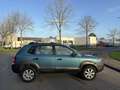 Hyundai TUCSON 2.0i Active 142 PK. Als nieuw rijdende inruilauto Grün - thumbnail 4