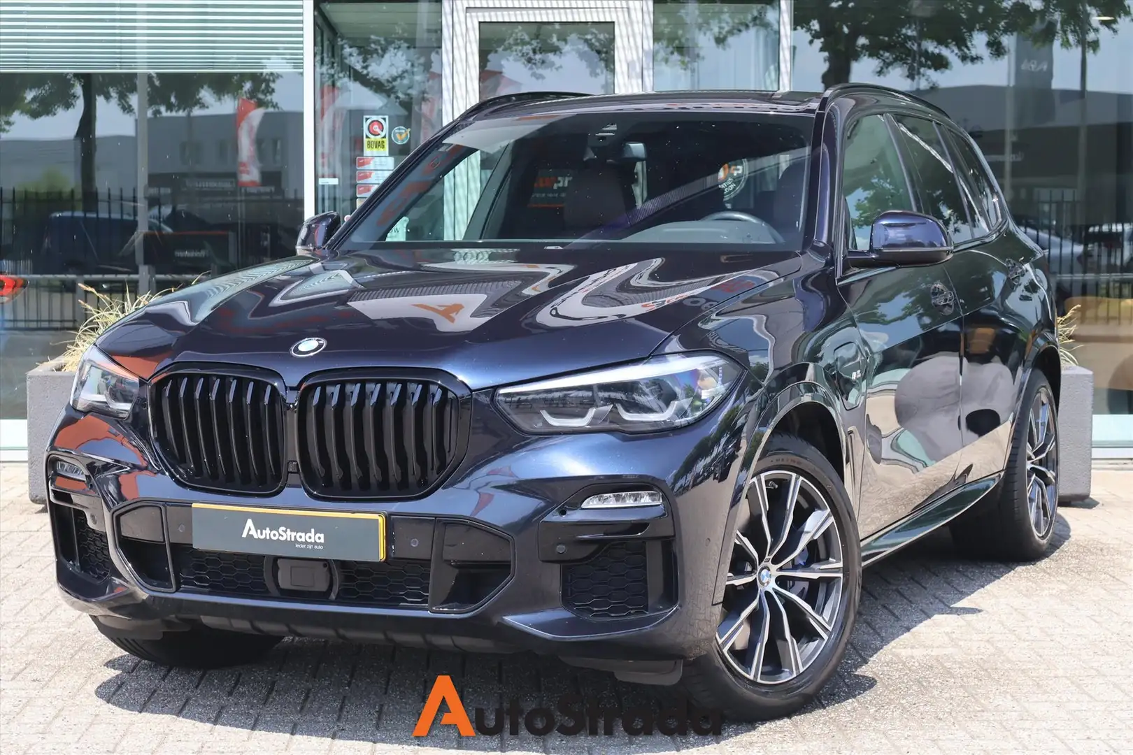 BMW X5 (g05) xDrive45e M-Sport 394pk | Camera | Carplay | Zwart - 1