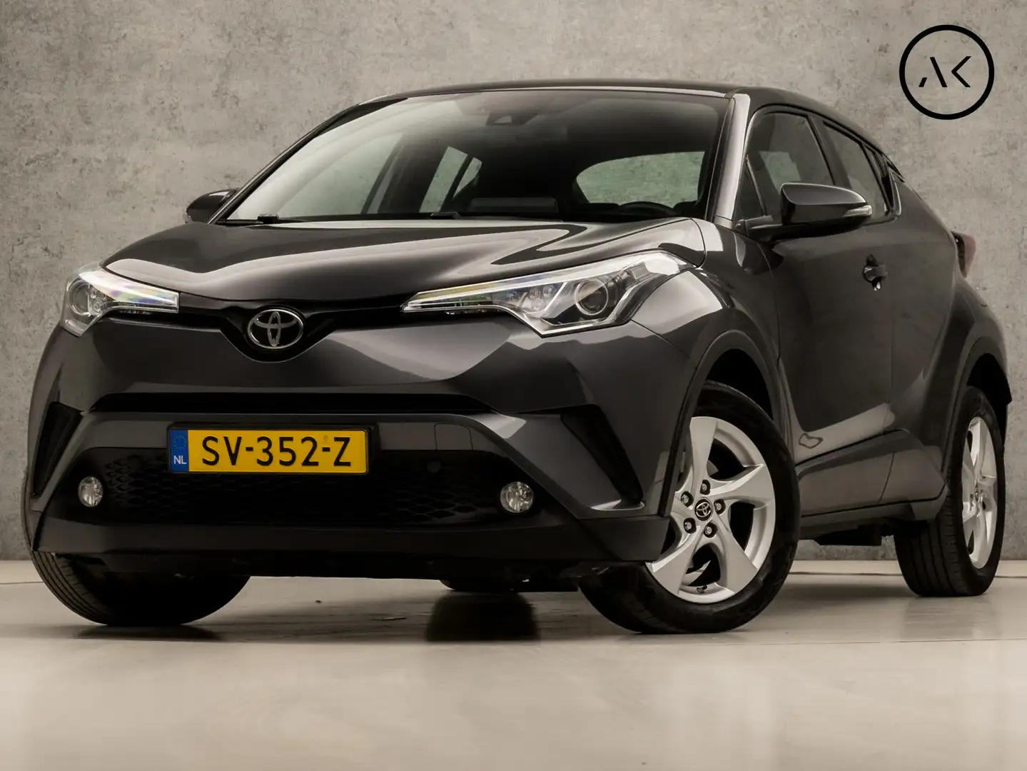 Toyota C-HR 1.2 Design (NAVIGATIE, CAMERA, XENON, SPORTSTOELEN Grijs - 1