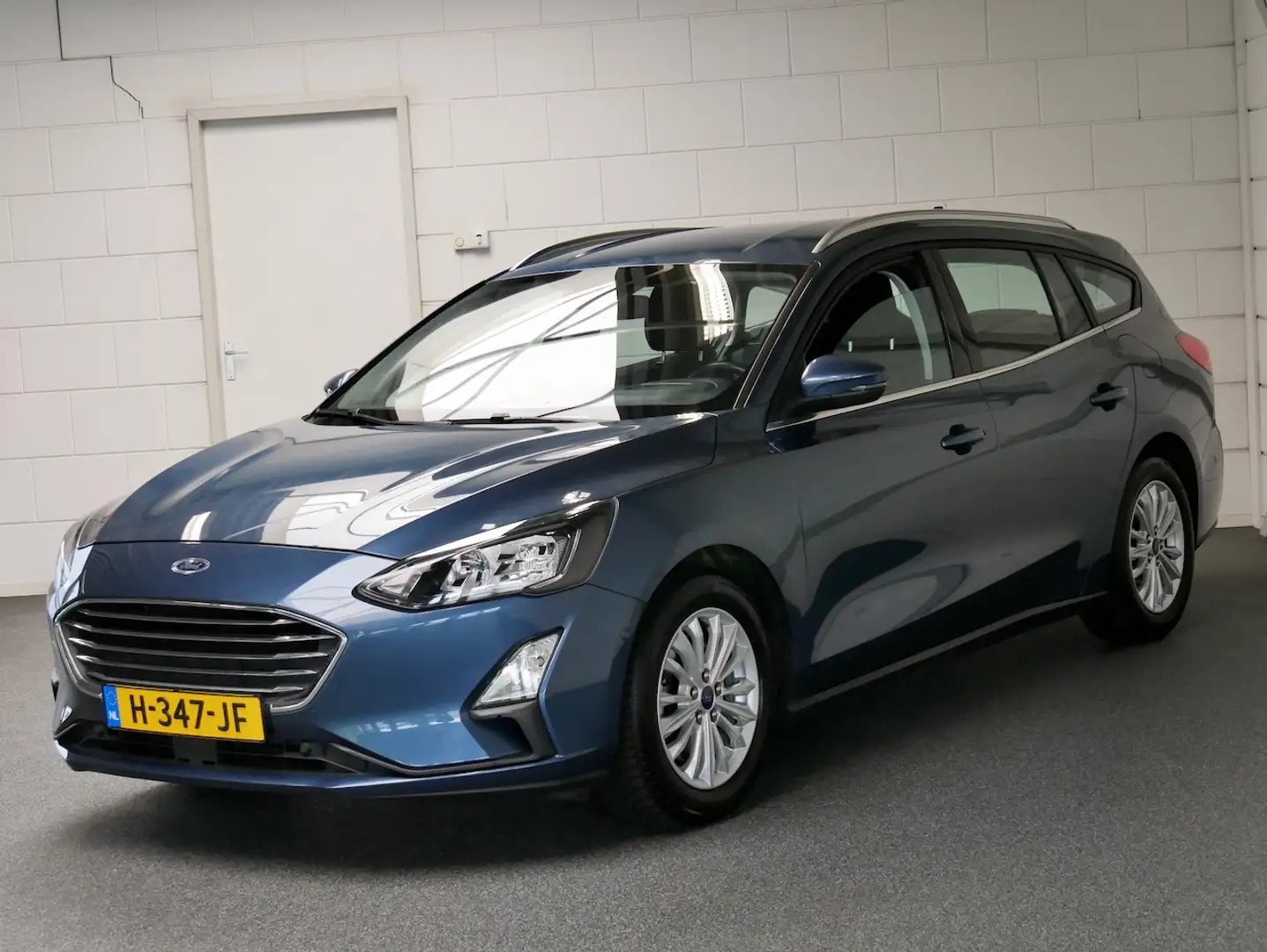 Ford Focus Wagon 1.0 125pk Titanium Navi/ECC/AGR/Cam/TH/Carpl Blauw - 2