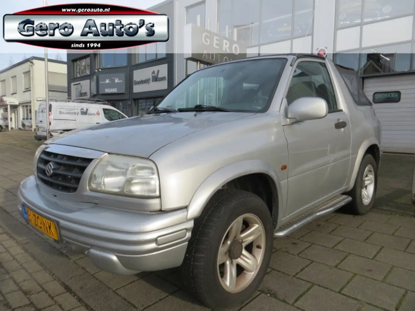 Suzuki Grand Vitara 1.6 Cabrio 4 persoons uitvoering nw apk elec ramen Grijs - 1