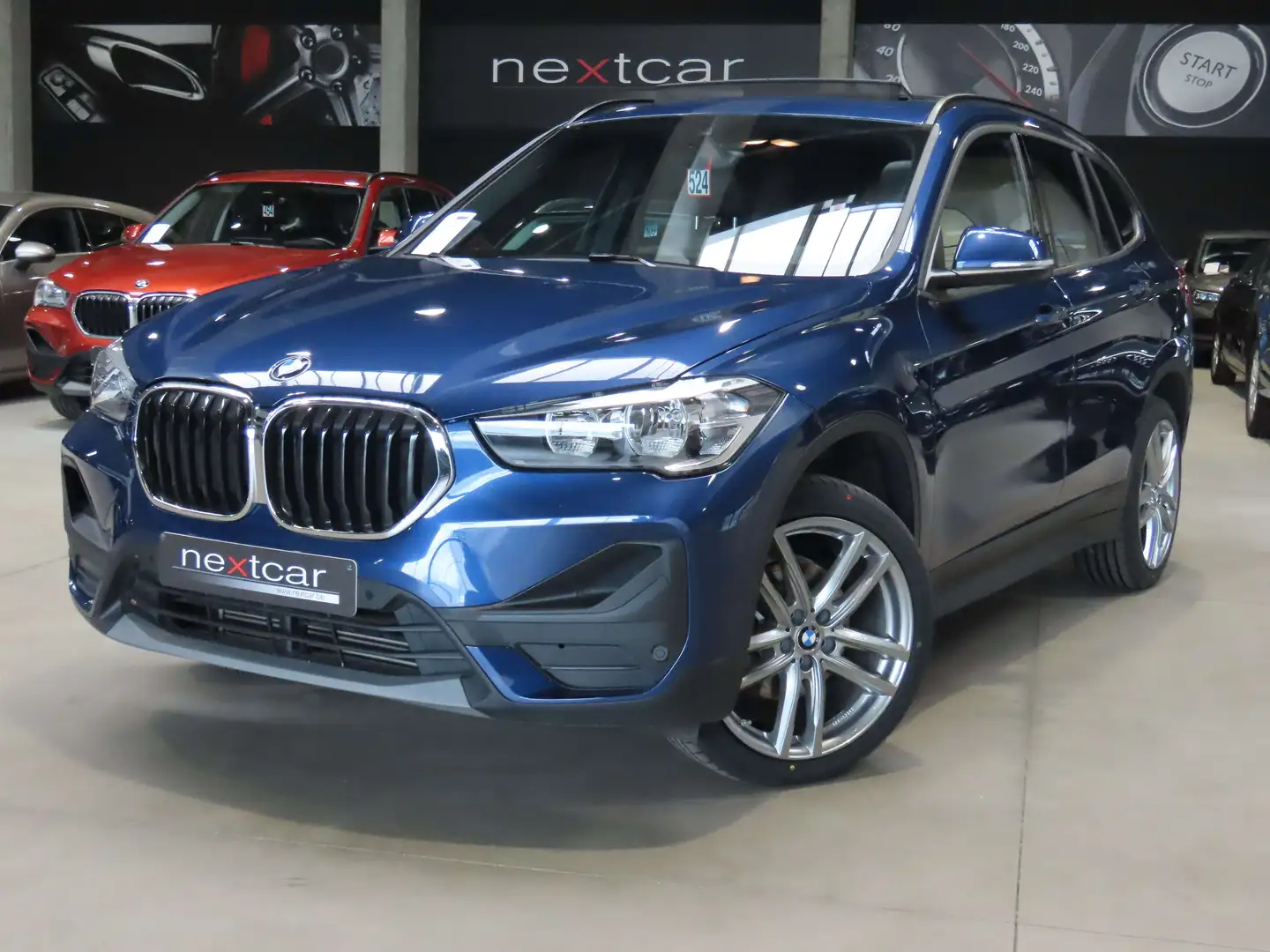BMW X1 18iA sDrive *PANO-CUIR-NAVI PRO-PARKING-CRUISE* Bleu - 1
