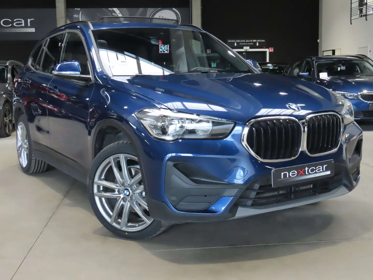BMW X1 18iA sDrive *PANO-CUIR-NAVI PRO-PARKING-CRUISE* Bleu - 2
