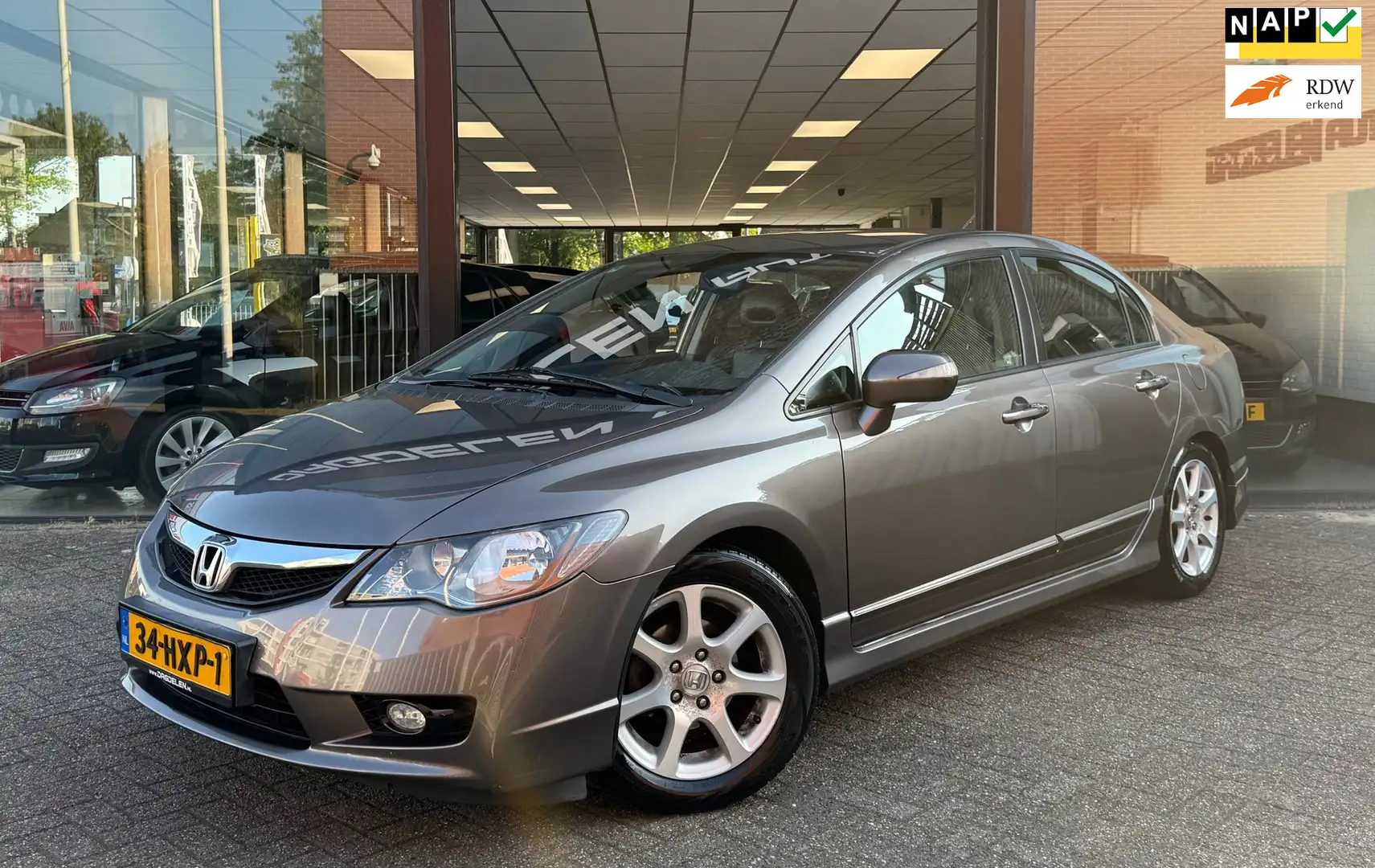 Honda Civic 1.3 Hybrid AUTOMAAT | AIRCO | CRUISE | NAVI | NAP Grigio - 1