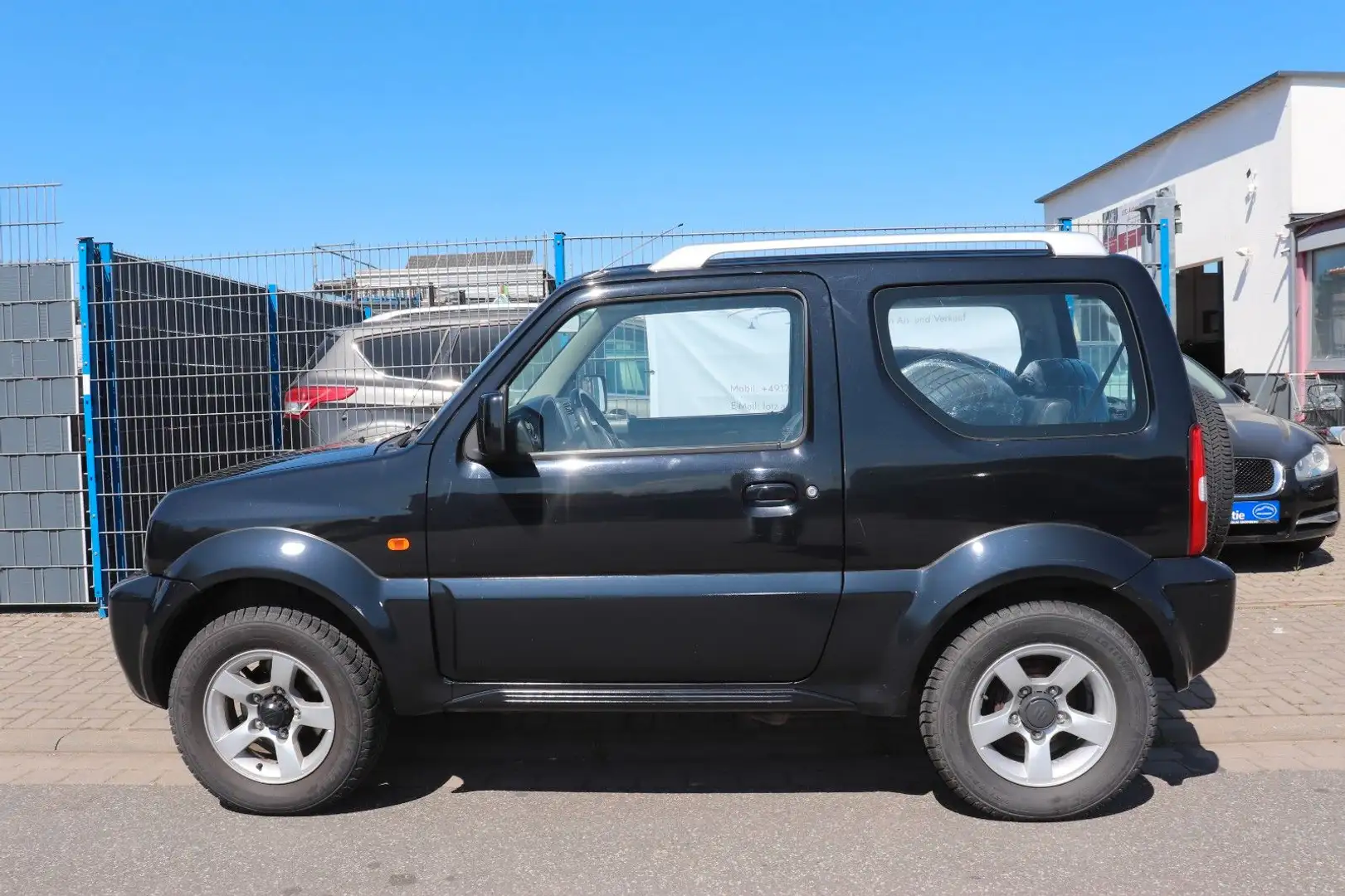 Suzuki Jimny 1.3 4WD Schwarz - 1