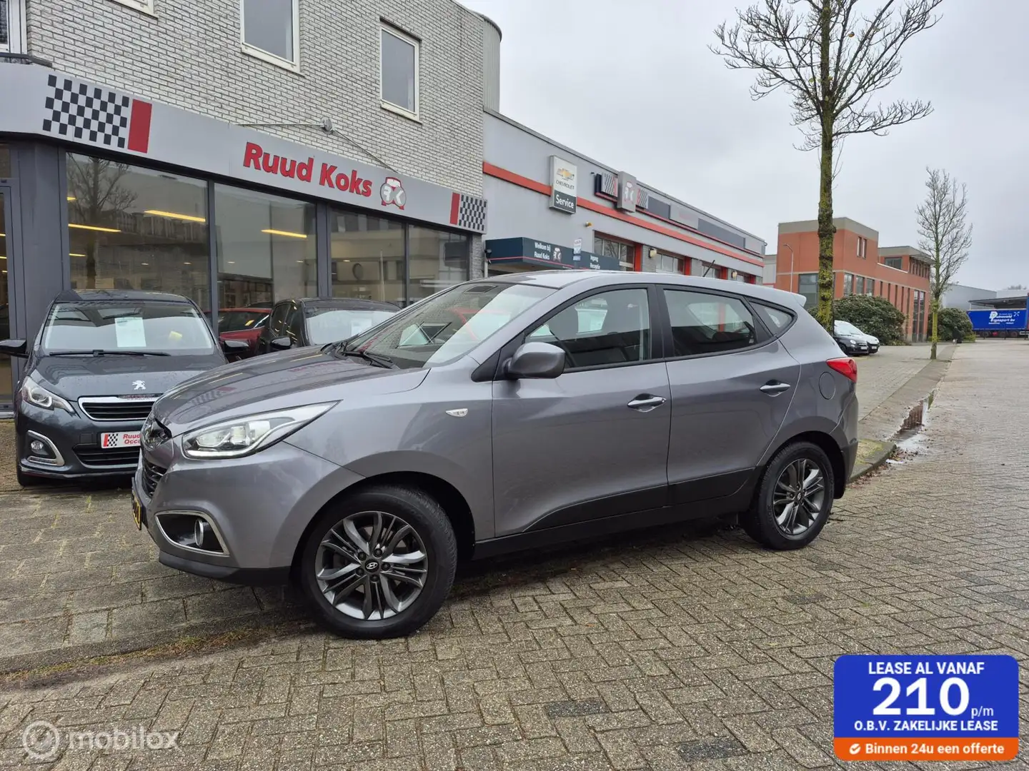 Hyundai iX35 1.6i GDI i-DRIVE / Cruise Control / Grijs - 1