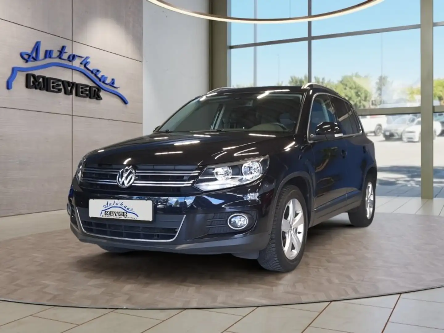 Volkswagen Tiguan 1.4TSI  AHK/Navi/SHZ/Tempomat Czarny - 1