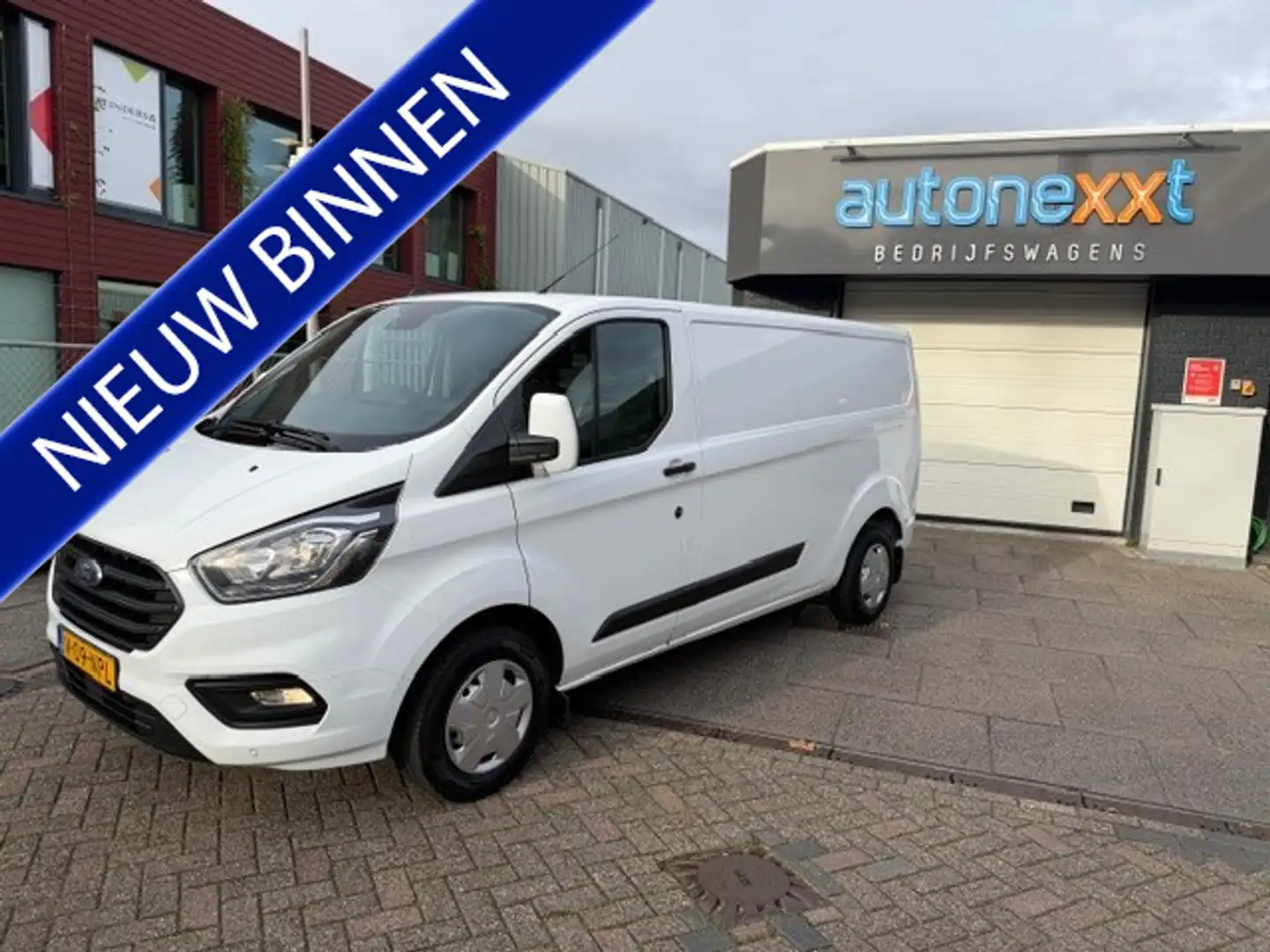 Ford Transit Custom 300 2.0 TDCI L2H1 Trend AIRCO I PDC I 3-ZITS I 1e Wit - 1