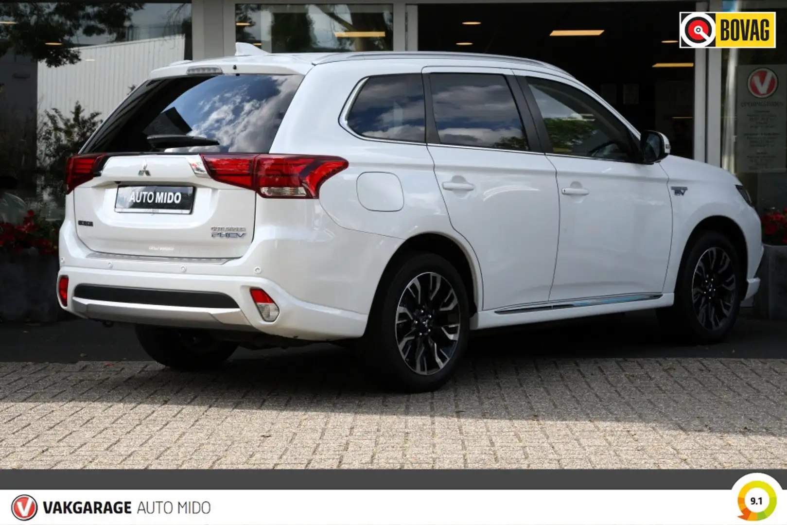 Mitsubishi Outlander 2.0 PHEV 4WD Prestige+ | 1e eigenaar | LAGE KM STA Wit - 2