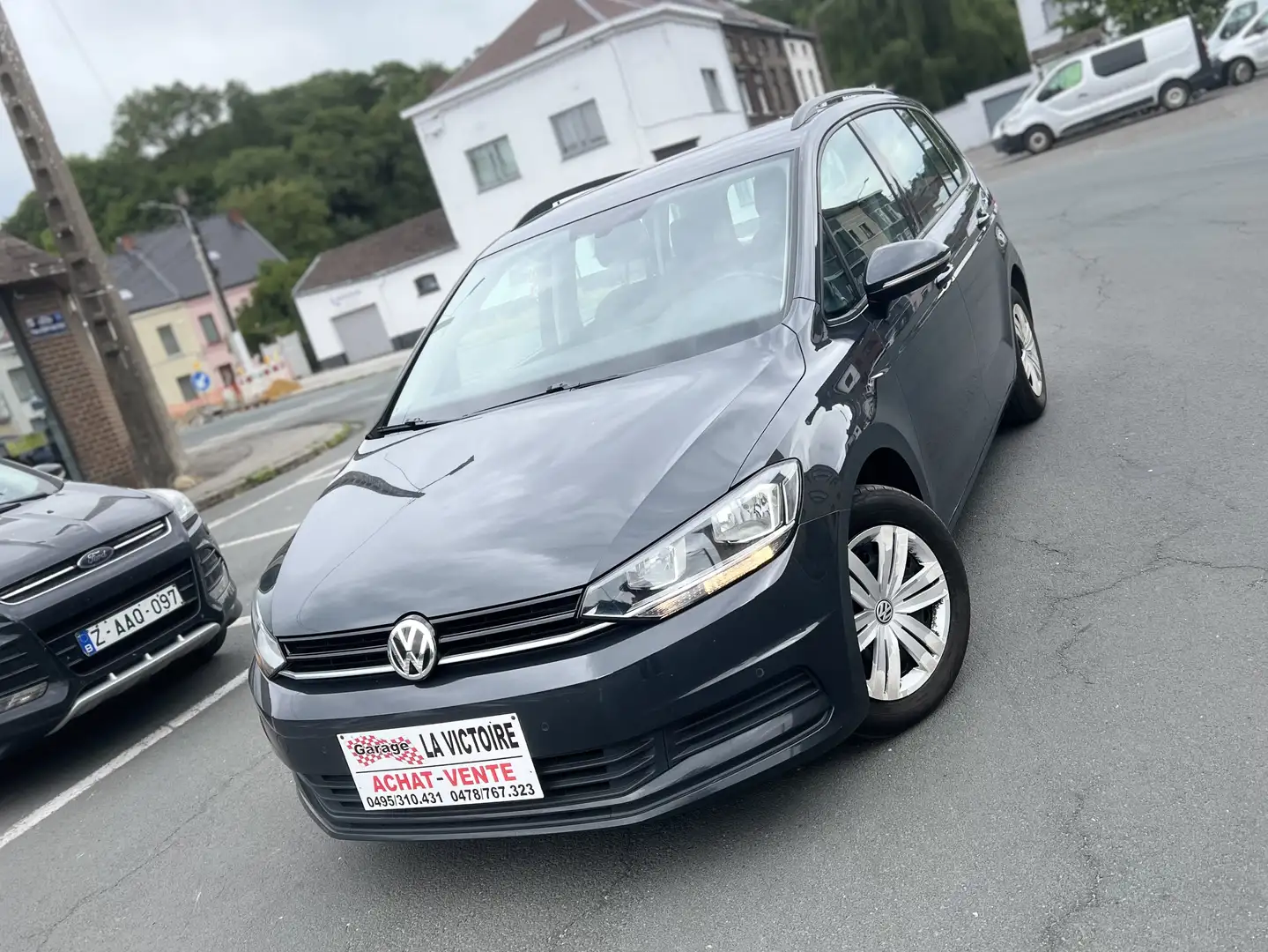 Volkswagen Touran 1.0 TSI 7 PLaces//Gps//CLim//Euro 6d-TEP Grijs - 1