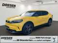 Ford Capri Dual-Motor AWD Premium + el. AHK & Fahrerassistenz Amarillo - thumbnail 1