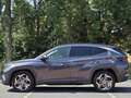 Hyundai TUCSON 1.6 T-GDI HEV 230PK Premium | 1650 kg trekvermogen Grijs - thumbnail 2