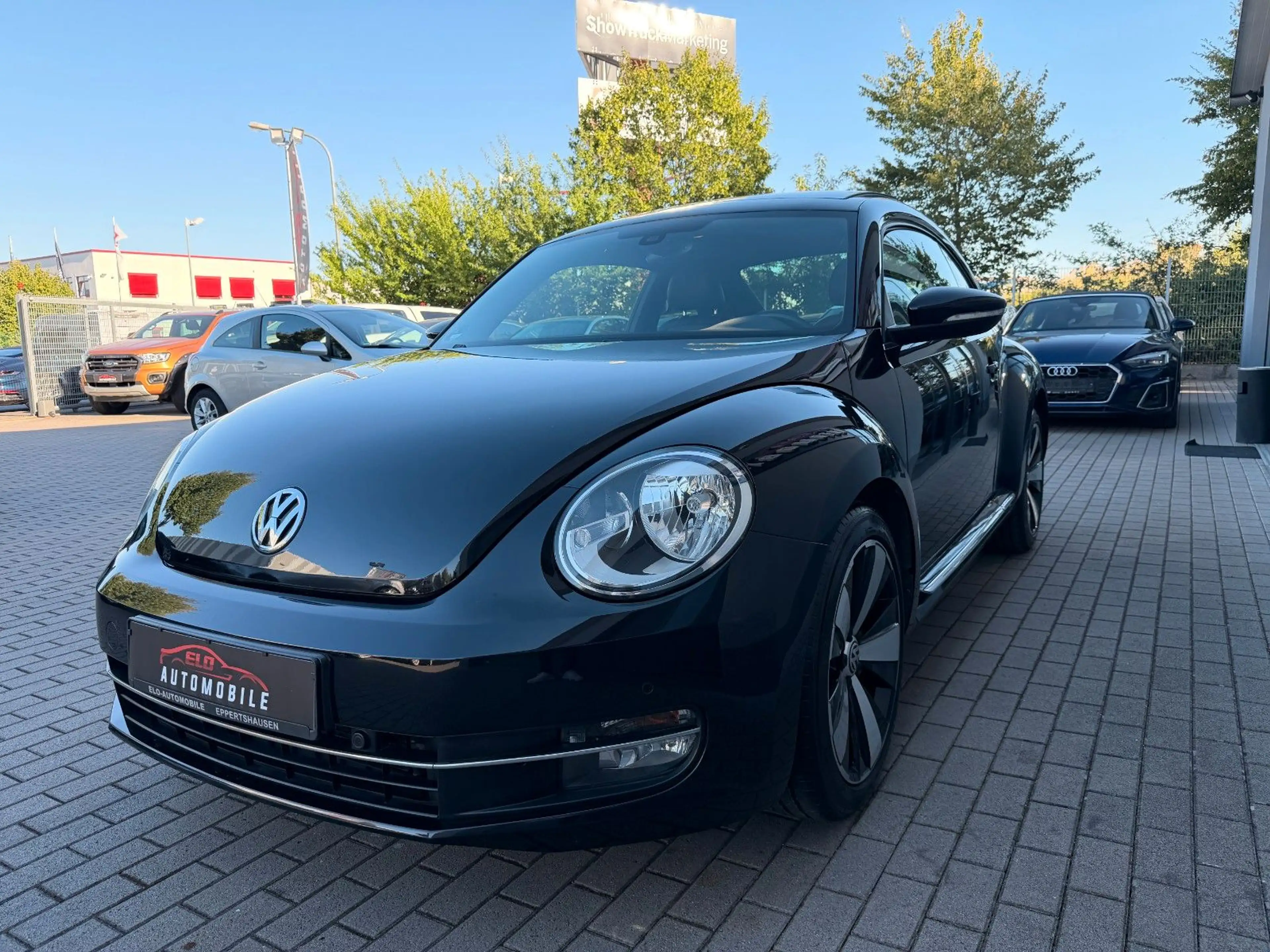 Volkswagen Beetle 1.4 TSI Design*Automatik*Panorama*Fender* — photo 6