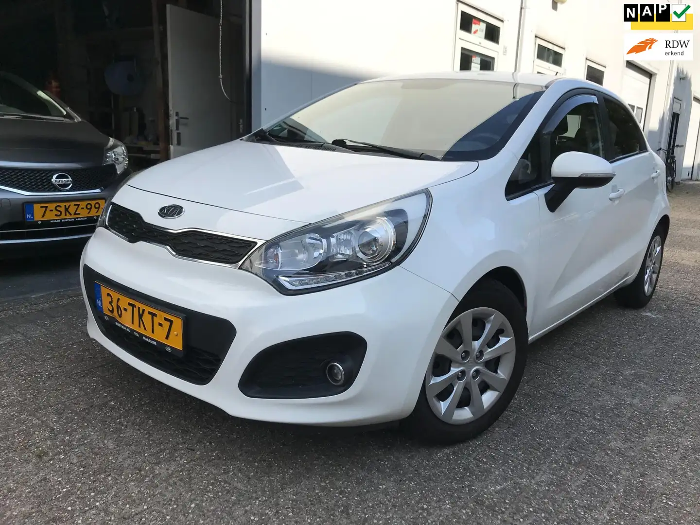 Kia Rio 1.2 CVVT Plus Pack Airco NAP Wit - 1