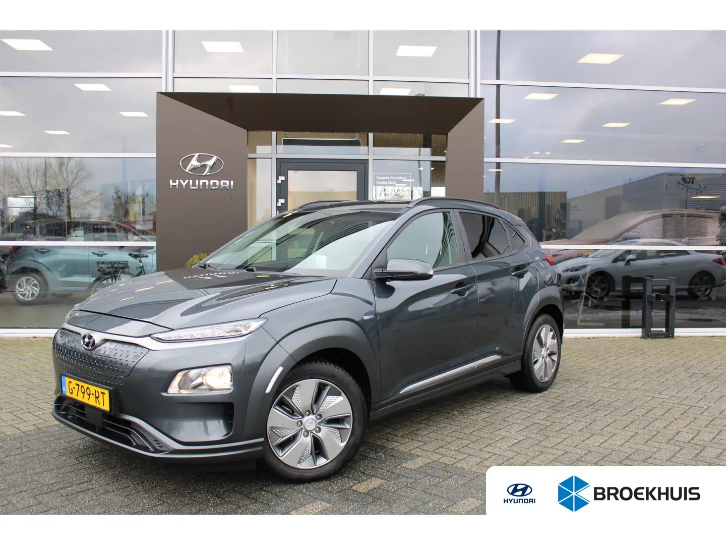 Hyundai KONA EV Fashion 64 kWh | Parkeersensoren achter | Cruis Grijs - 1