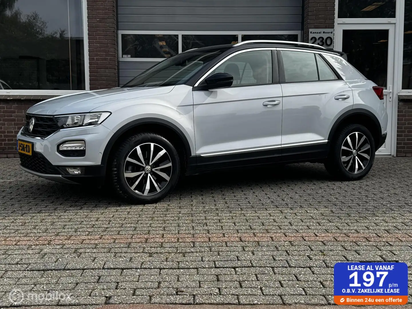 Volkswagen T-Roc 1.5 TSI Style CAMERA/CARPLAY/AIRCO/TREKHAAK Wit - 1