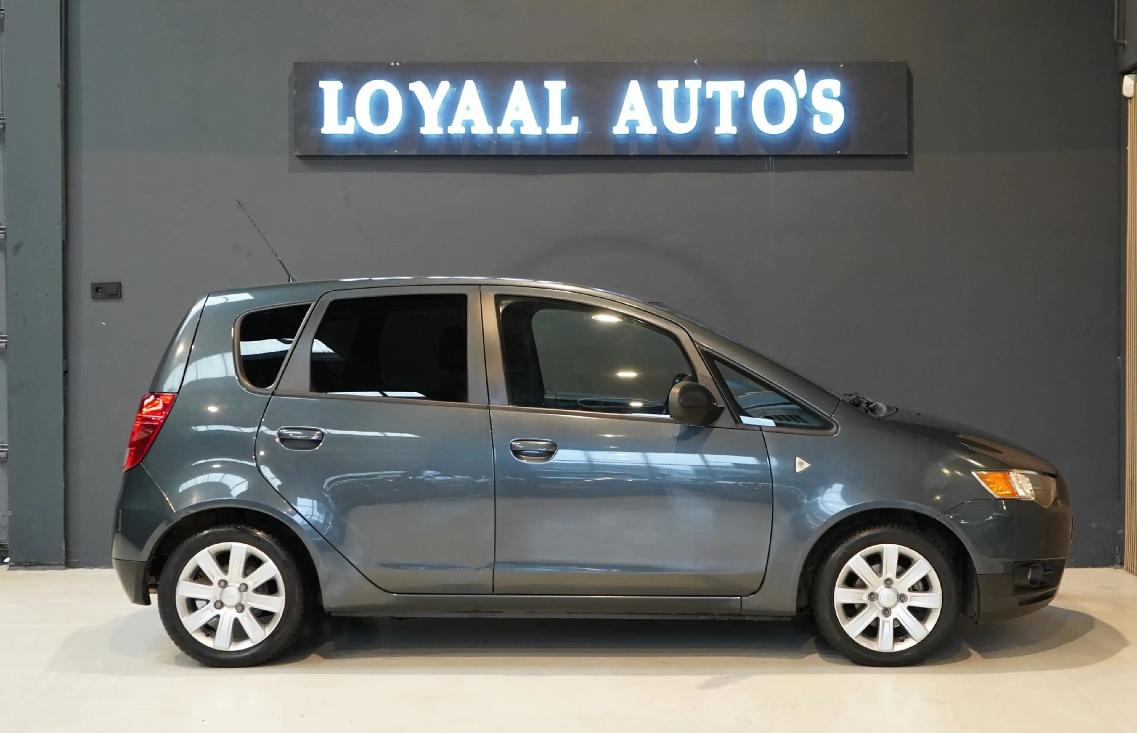 Mitsubishi Colt 1.3 Edition Two | AUTOMAAT | ACHTERUITRIJC. | NAVI — photo 9