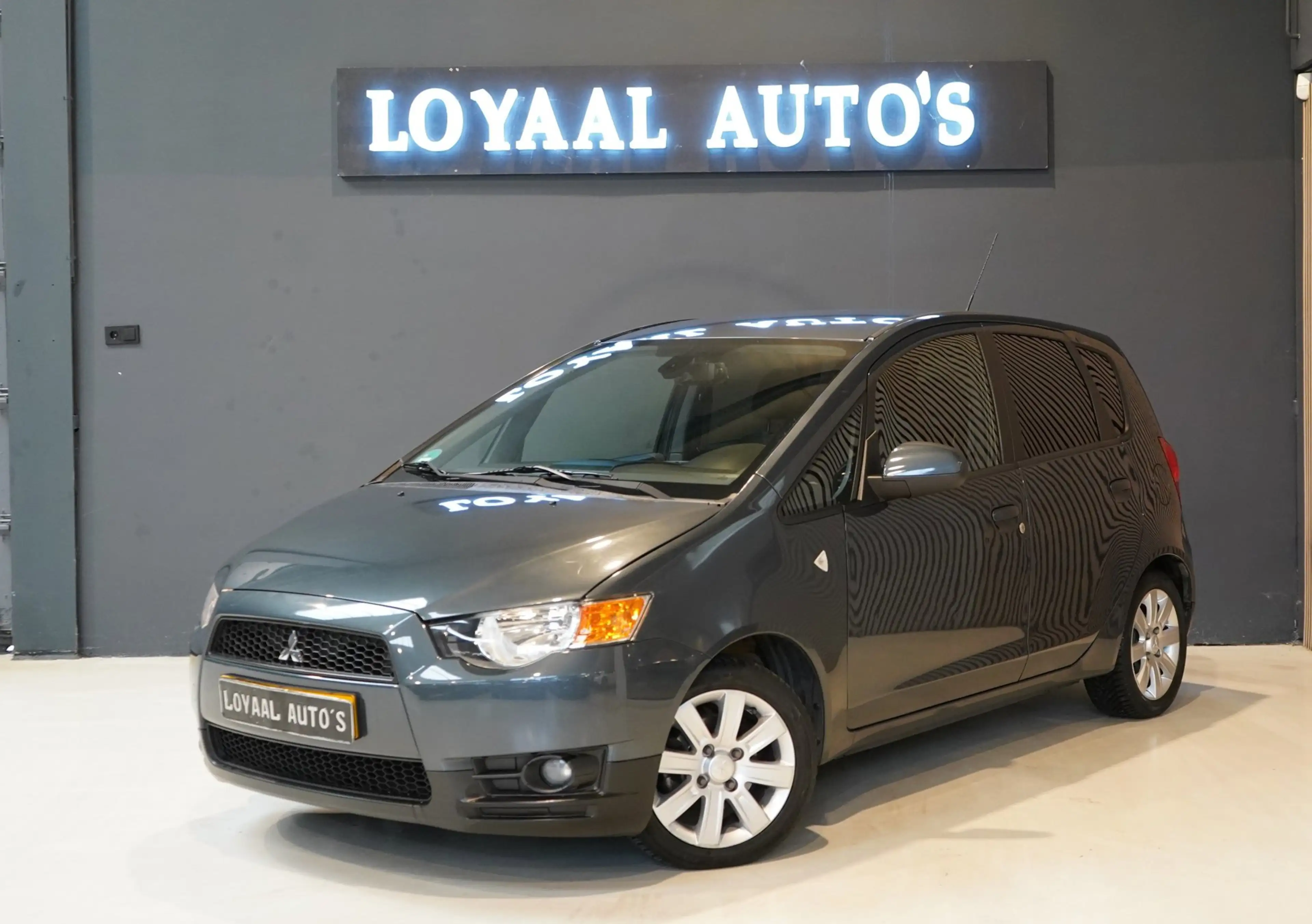 Mitsubishi Colt 1.3 Edition Two | AUTOMAAT | ACHTERUITRIJC. | NAVI — photo 4