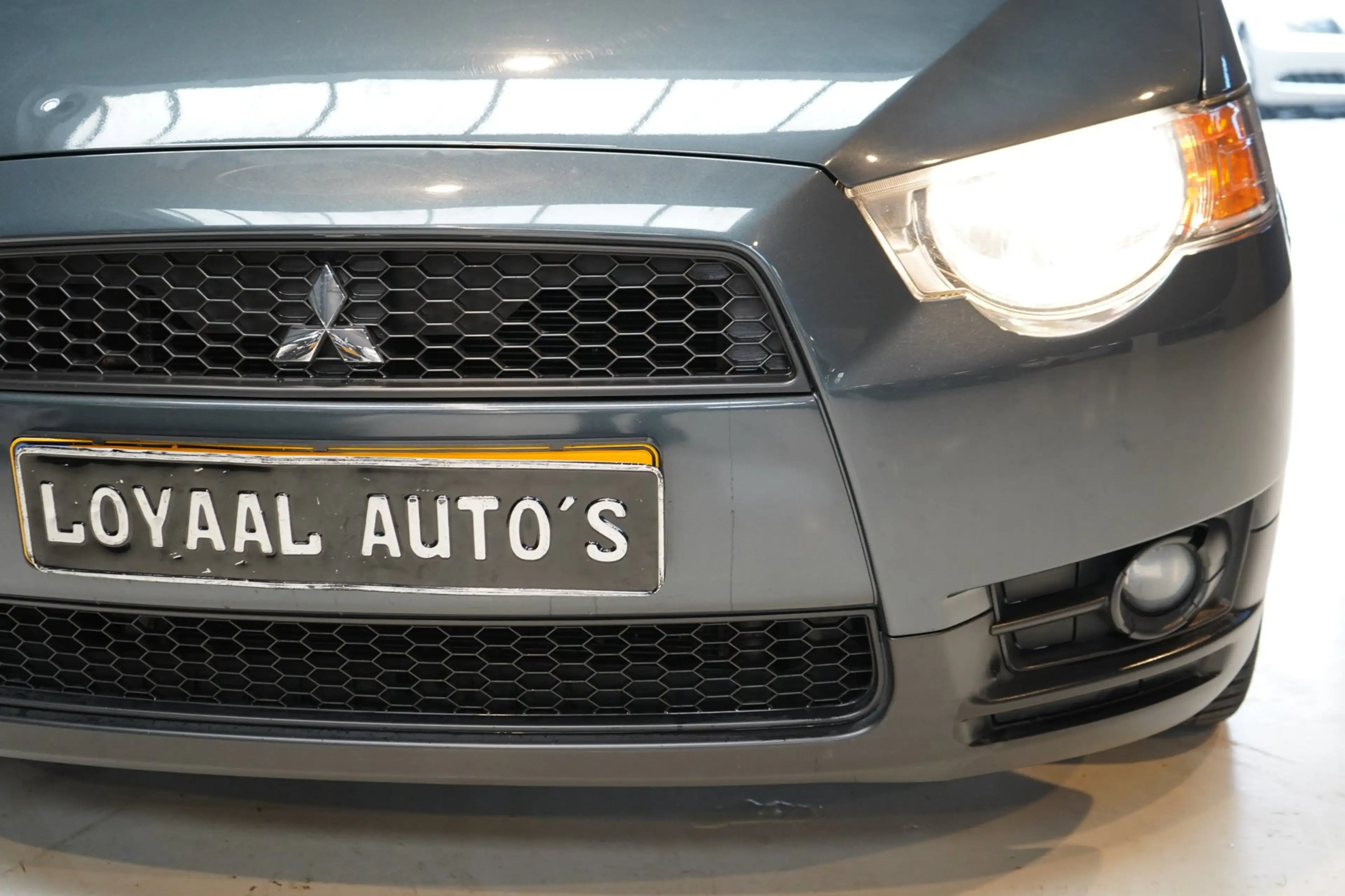 Mitsubishi Colt 1.3 Edition Two | AUTOMAAT | ACHTERUITRIJC. | NAVI — photo 11