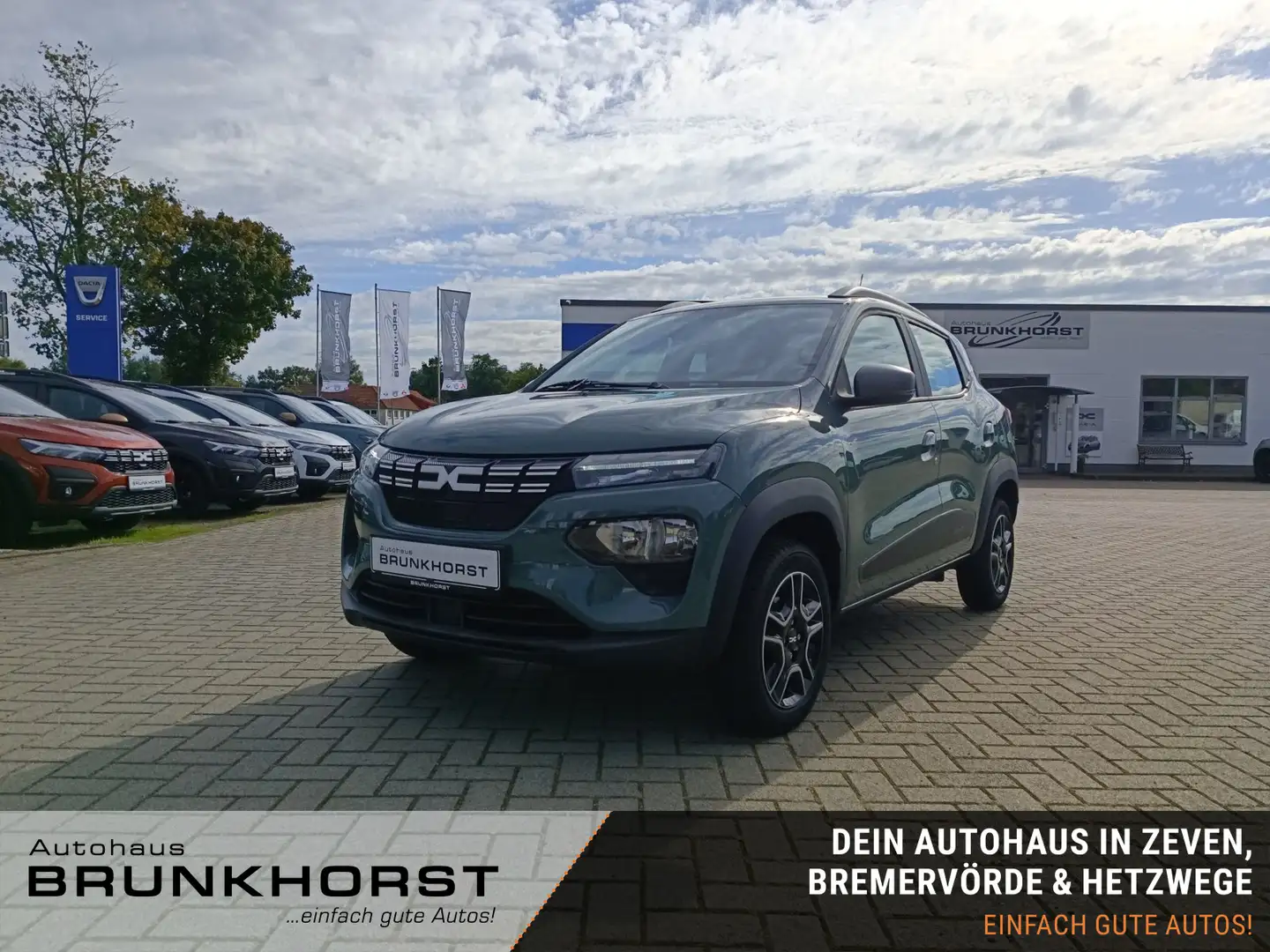 Dacia Spring Electric 45  Essential CCS+Navi+GJR Grün - 1