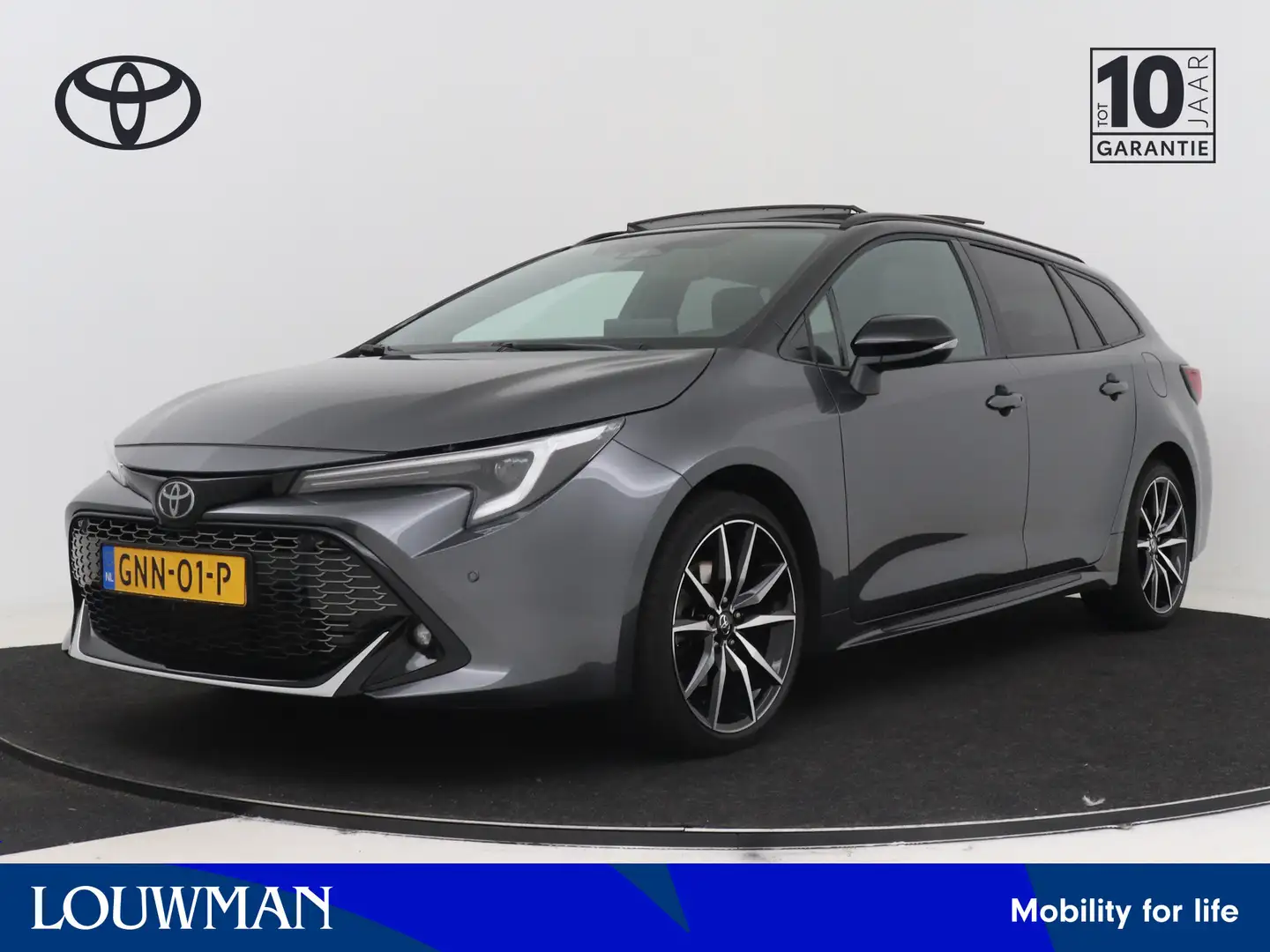 Toyota Corolla Touring Sports Hybrid 200 Business GR Sport Plus | Gris - 1