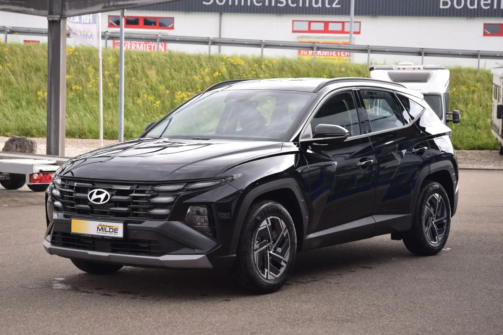 Hyundai TUCSON 1.6 T-GDI NAVI KAMERA SHZ LED AHK VORB. Schwarz - 1