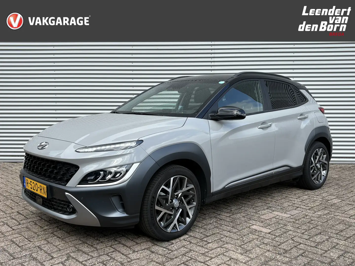 Hyundai KONA 1.6 GDI HEV Premium AUTOMAAT | Trekhaak | Navigati Grijs - 1