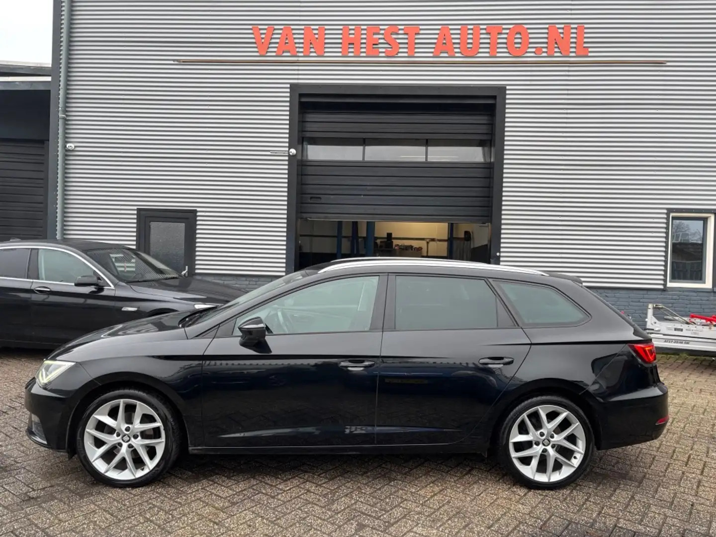 SEAT Leon ST 1.4 TSI X-PERIENCE | 3 MND GAR | NAVI | CLIMA | Zwart - 1