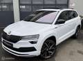 Skoda Karoq 1.5 TSI ACT Sportline Pano Canton-sound Winterpack Weiß - thumbnail 28