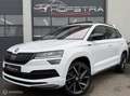 Skoda Karoq 1.5 TSI ACT Sportline Pano Canton-sound Winterpack Weiß - thumbnail 1