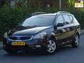 Kia Ceed / cee'd Sporty Wagon 1.4 CVVT NAP/AIRCO/CRUISE/PDC/NW APK Zwart - thumbnail 1