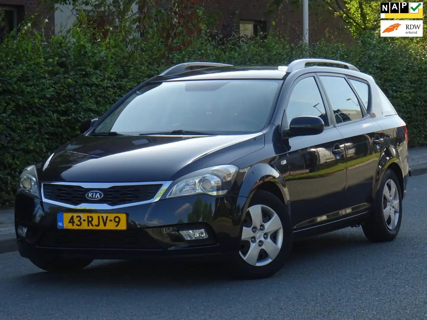 Kia Ceed / cee'd Sporty Wagon 1.4 CVVT NAP/AIRCO/CRUISE/PDC/NW APK Zwart - 1