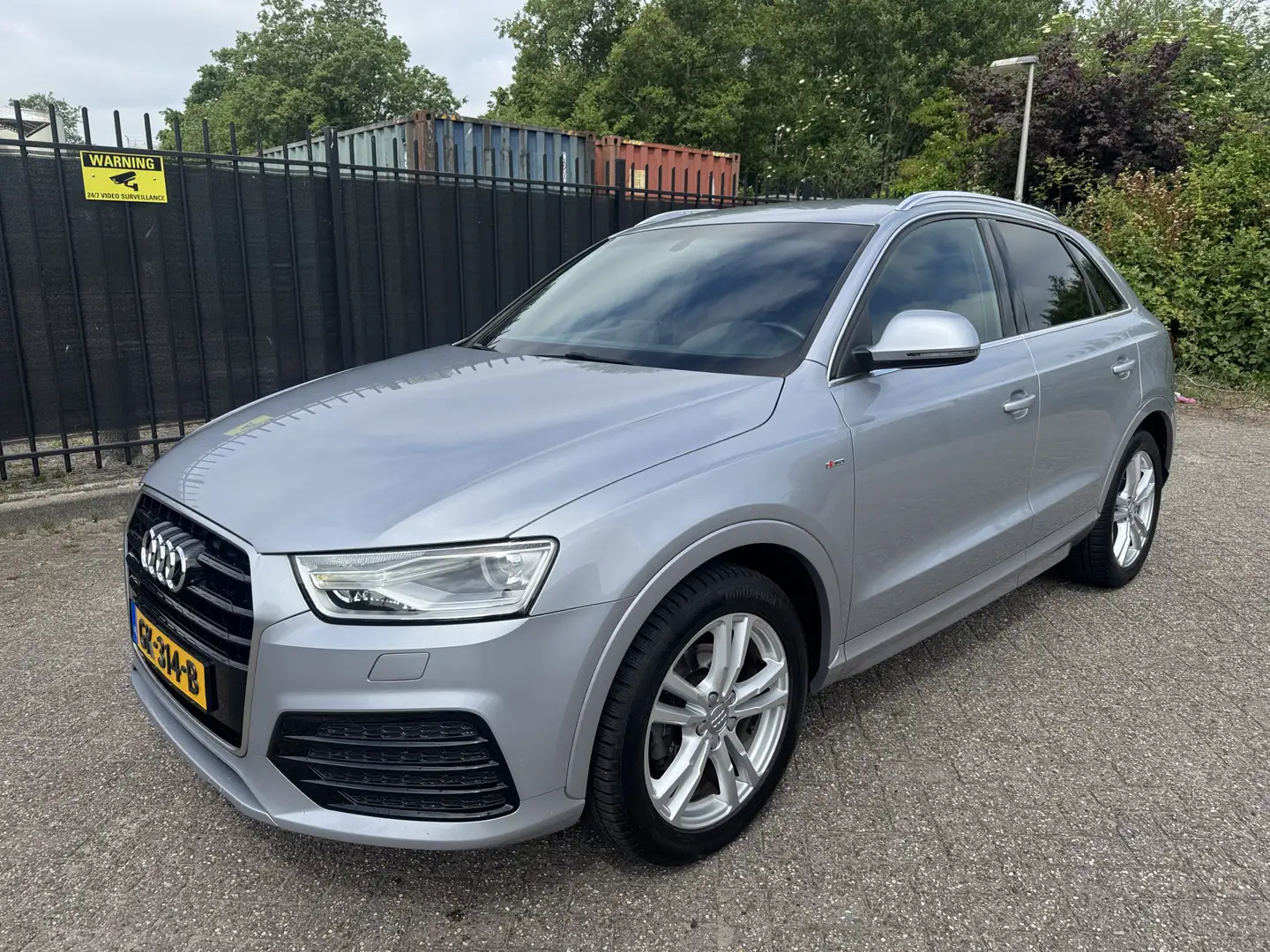 Audi Q3 1.4 TFSI CoD S-Line Edition Sprtleer/Clima/Navi Grijs - 1