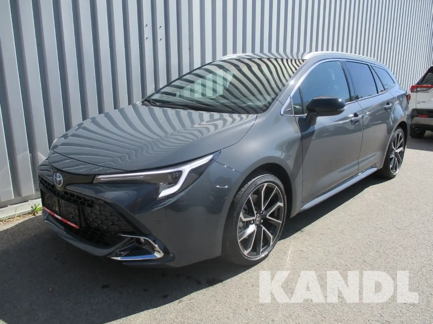 Toyota Corolla TS 2.0 HSD Lounge Grau - 1